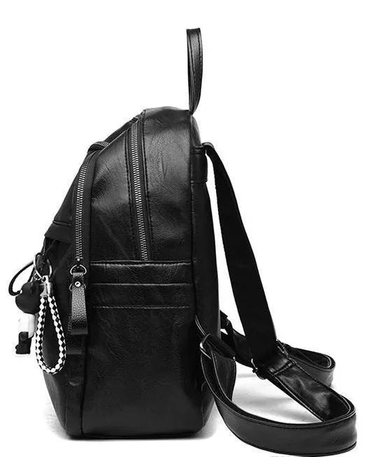 Black backpack with soft surface, double straps, and internal ID bag compartment showing 20-35L capacity