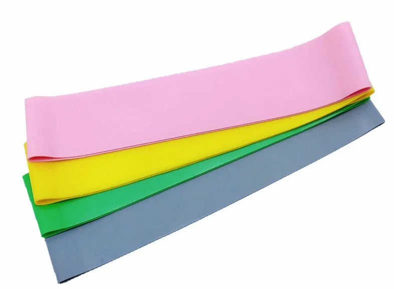 Latex resistance band 500mm x 50mm x 0.3mm in orange, pink, or red for yoga and fitness exercise