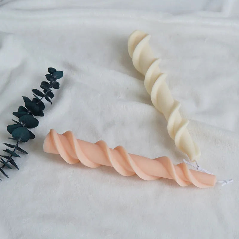 Handmade spiral lace rod silicone mould for decorative candles, shown in photo colour.