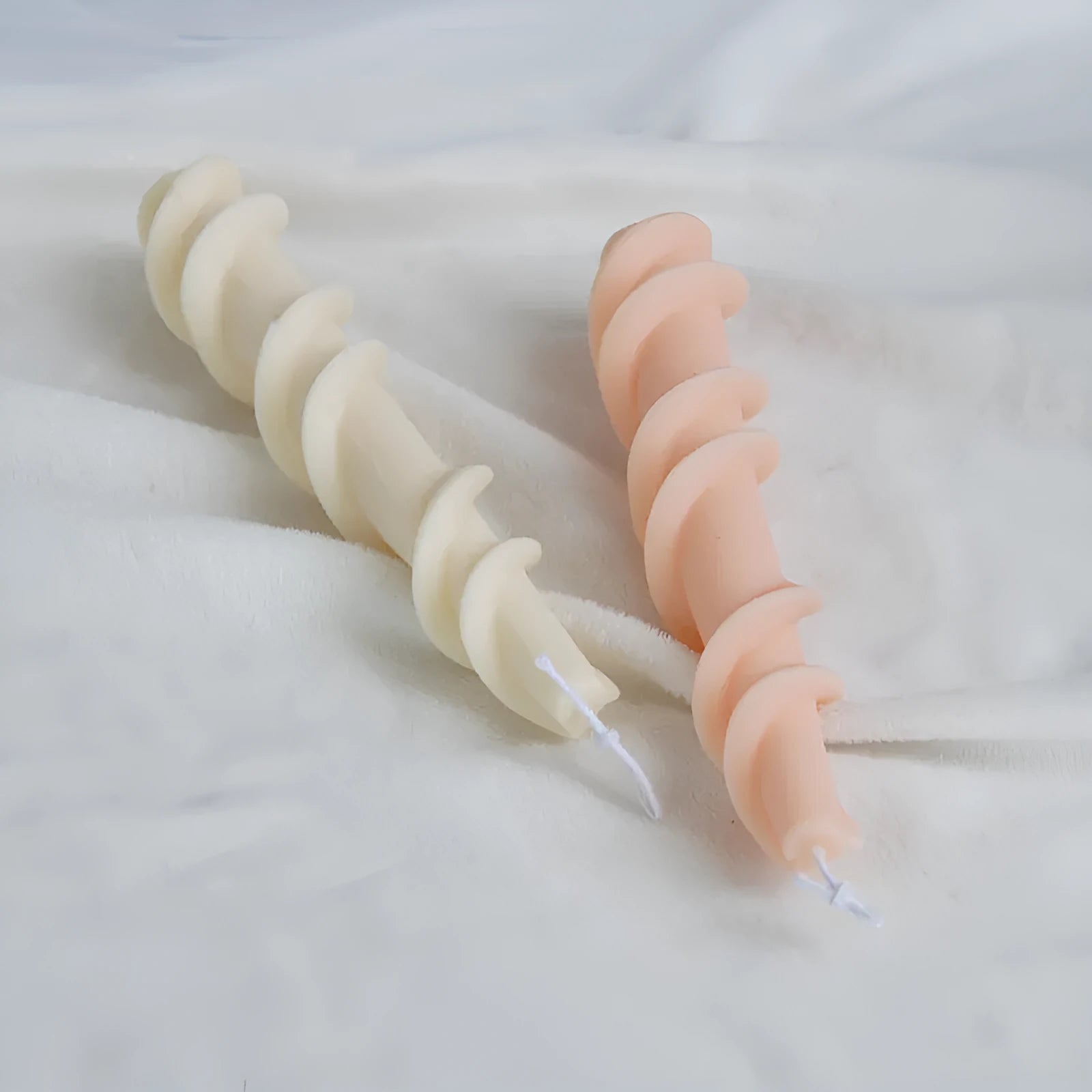Handmade spiral lace rod silicone mould for decorative candles, shown in photo colour.