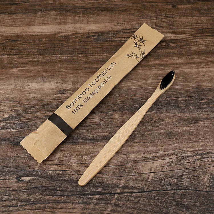 Set of 10 bamboo toothbrushes with charcoal bristles in various colours showing 17.5cm handles
