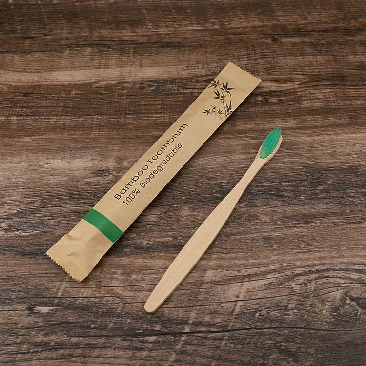 Set of 10 bamboo toothbrushes with charcoal bristles in various colours showing 17.5cm handles
