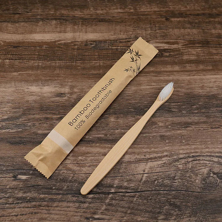 Set of 10 bamboo toothbrushes with charcoal bristles in various colours showing 17.5cm handles