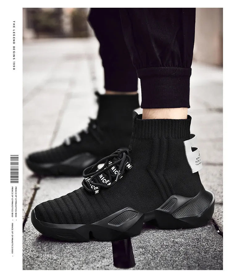 Men's black and white casual sports shoes with mesh lining and thick sole.
