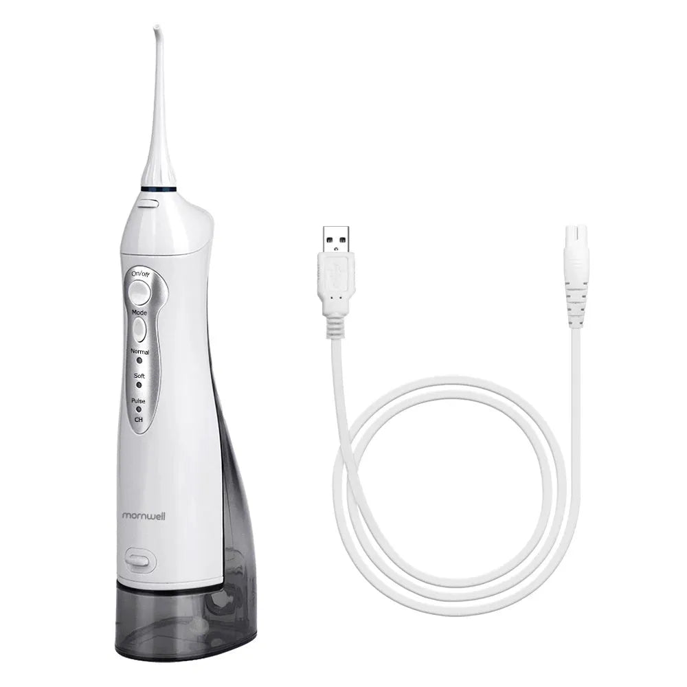 White portable oral irrigator water flosser with 330ml tank, four nozzles, and USB charger
