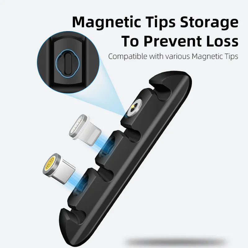 Black soft plastic desktop magnetic data cable organiser on a desk