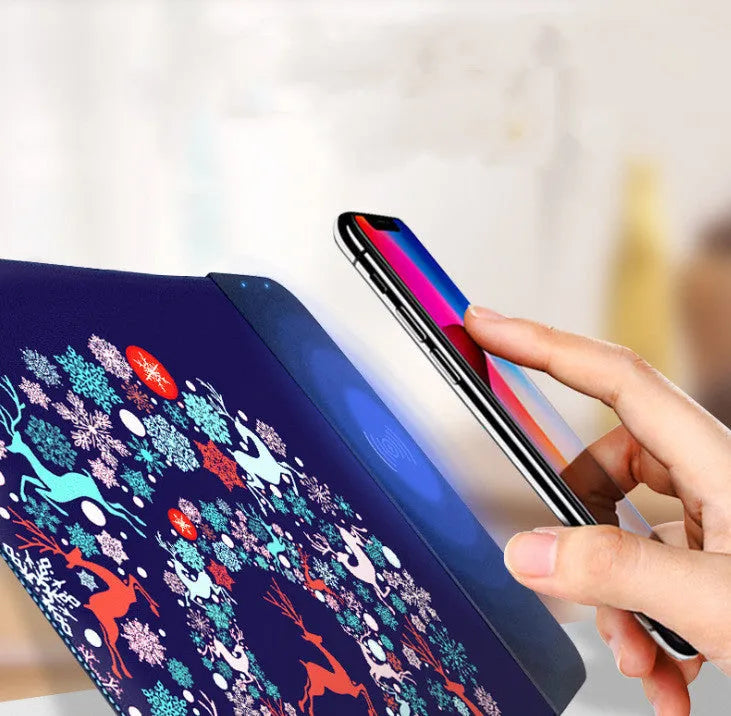 Wireless charging mouse pad with cartoon design, RGB lighting, and 298mm x 215mm dimensions on desk