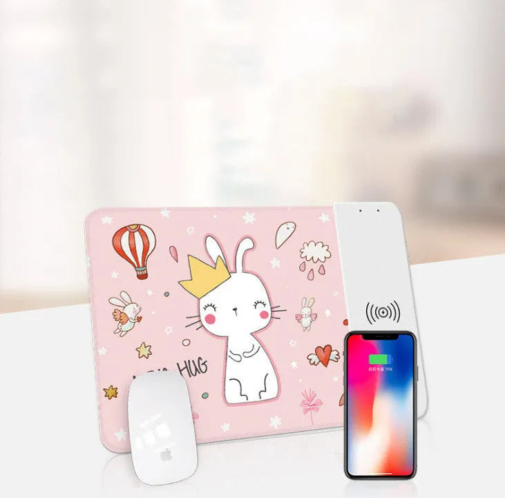 Wireless charging mouse pad with cartoon design, RGB lighting, and 298mm x 215mm dimensions on desk