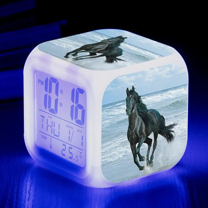 Square alarm clock with LED display and colour-changing feature, measuring 8x8cm, for bedroom or study room use
