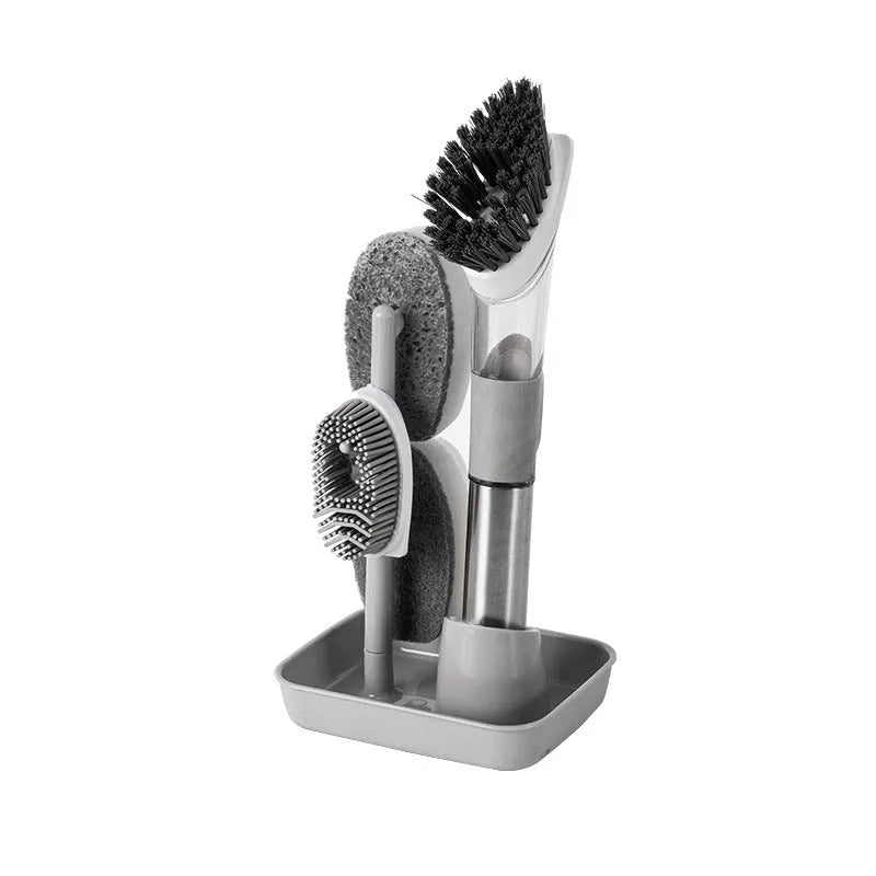 Long handled kitchen cleaning brush with a soap dispenser button and a stainless steel scouring block.
