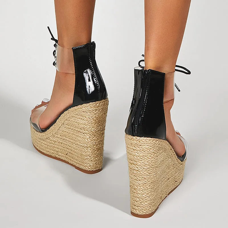 Black women's wedge sandals with hemp rope detailing on 8cm platform heel and adjustable front tie closure