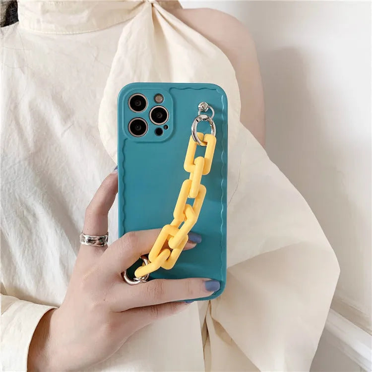 Huawei and iPhone mobile phone case with a photo frame window and a matching coloured wrist chain attached.