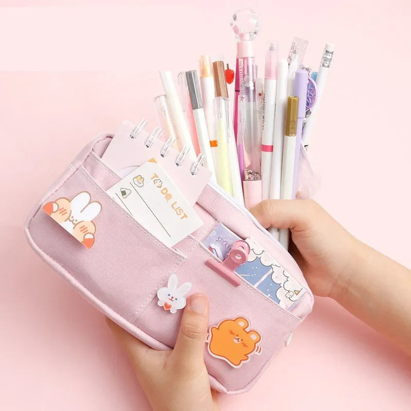 Canvas pencil case in Japanese Harajuku style with three random badges and a choice of Matcha green, Jade blue or Licorice powder