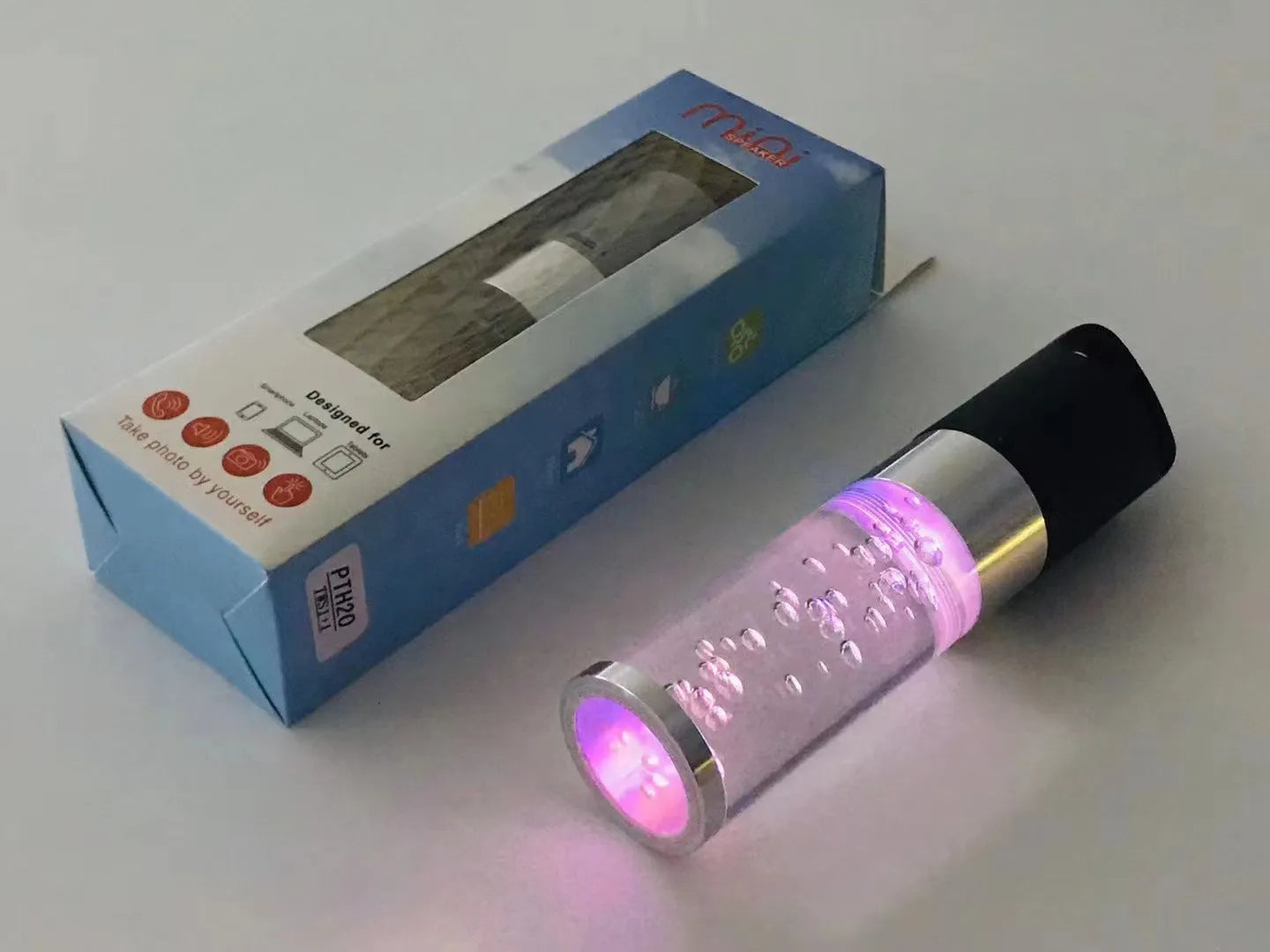Portable Bluetooth speaker with colourful crystal lights in compact 145mm design