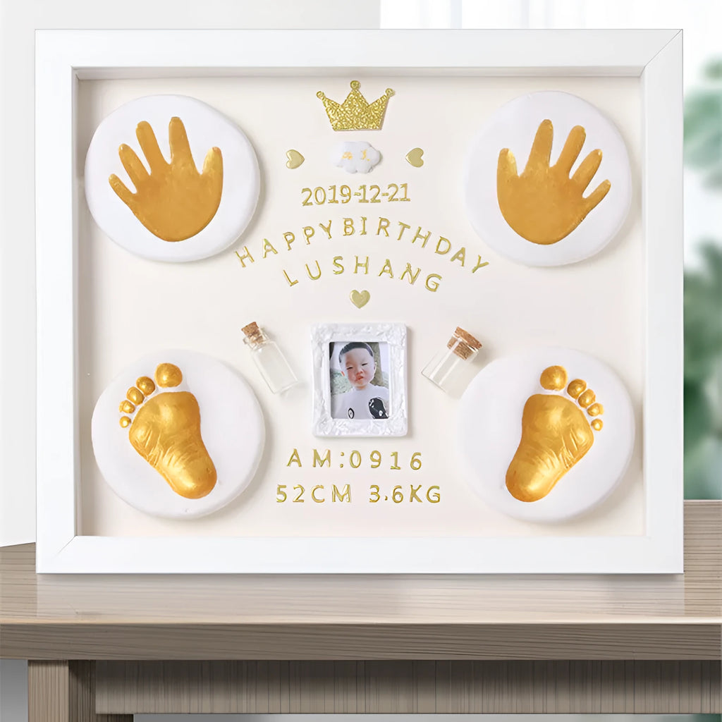 Modern DIY baby hand and foot print anniversary frame in white with optional warm LED lights.