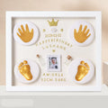 Modern DIY baby hand and foot print anniversary frame in white with optional warm LED lights.