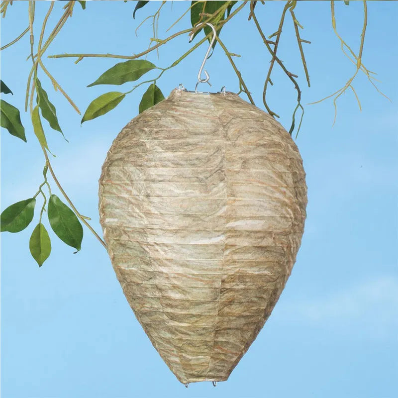 Hexagonal beehive lantern measuring 22cm by 28cm, made of paper and wire, weighing 30g.