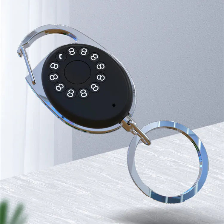 Black Bluetooth tracker with keychain for Apple-compatible item and pet tracking