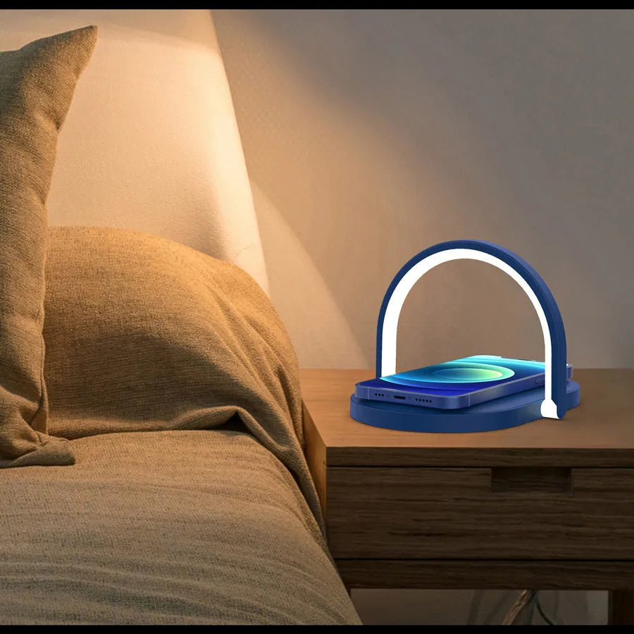 Black and white wireless charger with night light and phone holder showing 15W fast charging capability