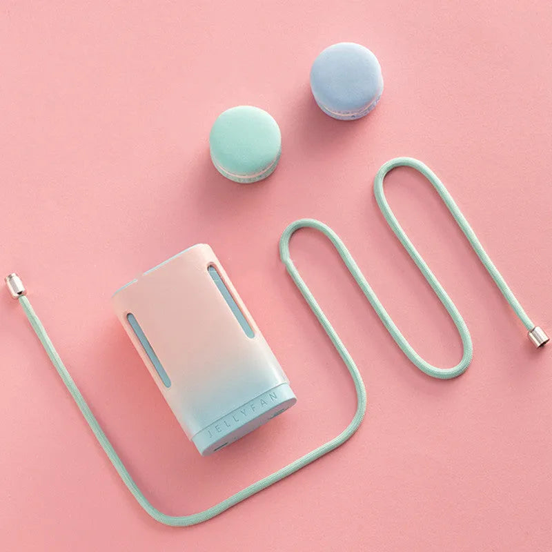 Jelly hanging neck USB mini fan showing mint peach colour and compact design