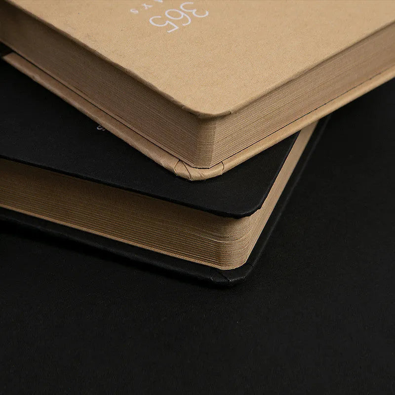 A5 hardcover locked diary notebook with key, shown in black and beige camel colour options.
