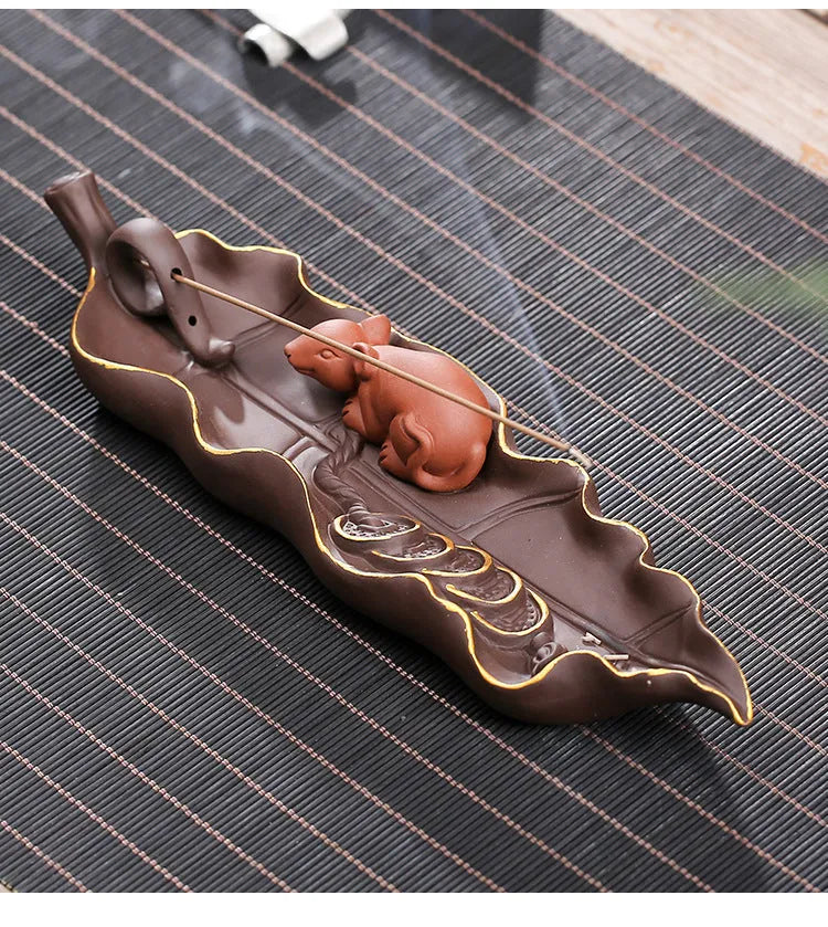 Purple clay ceramic lying incense burner for horizontal incense display and ash collection