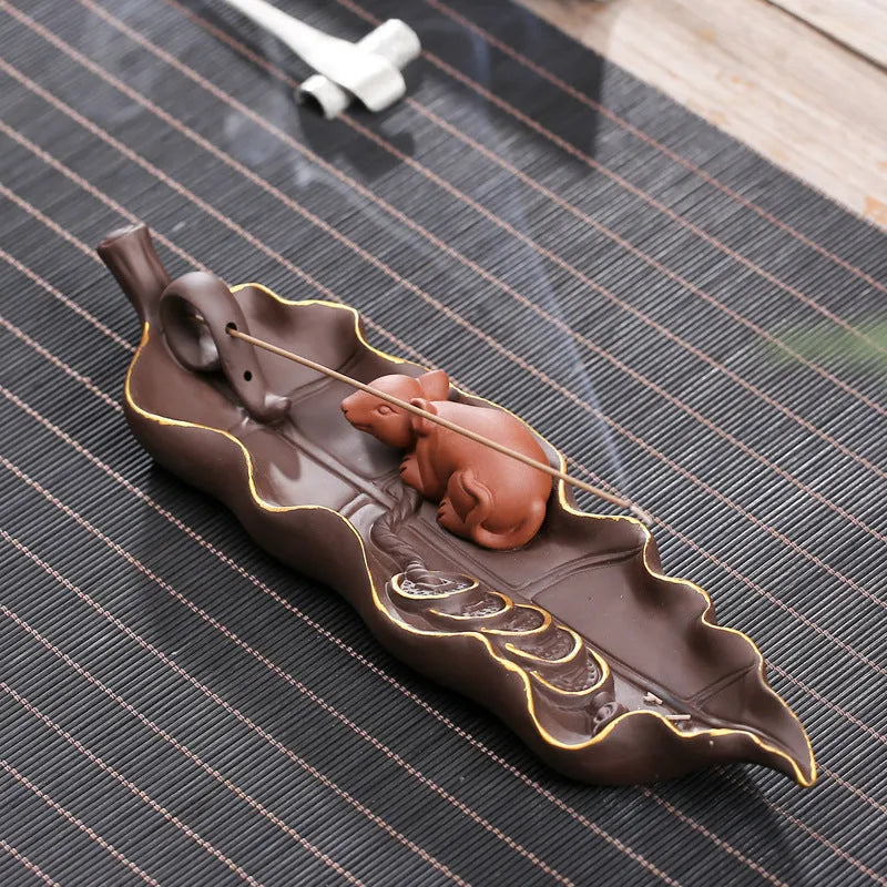 Purple clay ceramic lying incense burner for horizontal incense display and ash collection