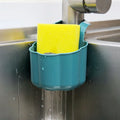 Nordic style dark blue plastic sink drain basket on a kitchen counter.