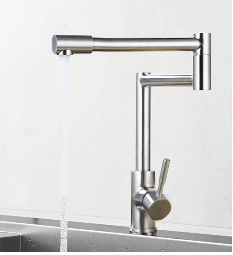 Silver stainless steel kitchen faucet with 360-degree rotating spout and dual handles for hot and cold water control