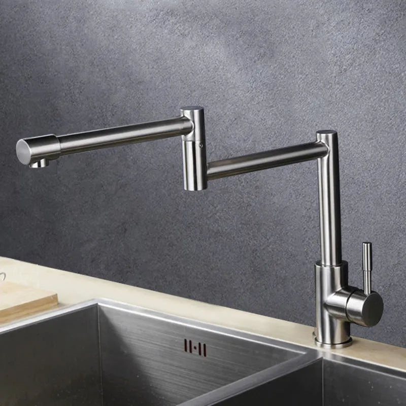 Silver stainless steel kitchen faucet with 360-degree rotating spout and dual handles for hot and cold water control