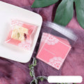 Pink self-adhesive plastic bag with UV printing, measuring 7cm by 7cm with 3cm expandable gusset for packaging