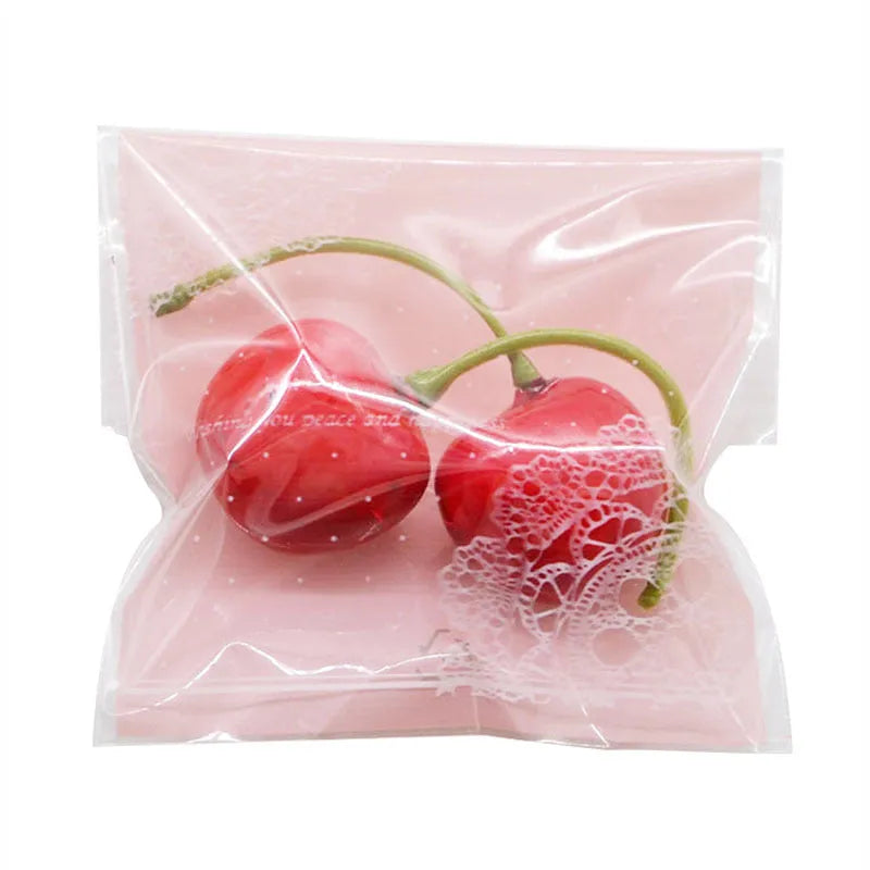 Pink self-adhesive plastic bag with UV printing, measuring 7cm by 7cm with 3cm expandable gusset for packaging