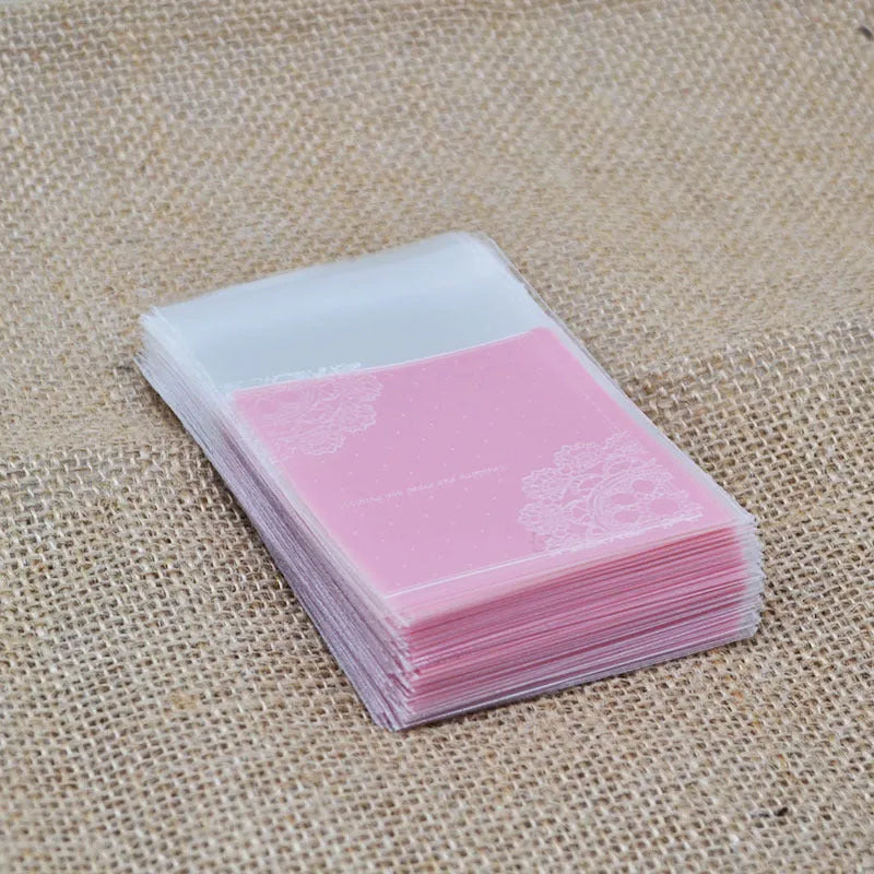 Pink self-adhesive plastic bag with UV printing, measuring 7cm by 7cm with 3cm expandable gusset for packaging