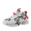 Children's spring sneakers with Velcro closure in beige blue, white red, and bright red colours showing rubber soles