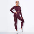 Women's long-sleeved seamless yoga suit in a striped pattern, shown in a stretch fabric suitable for exercise.