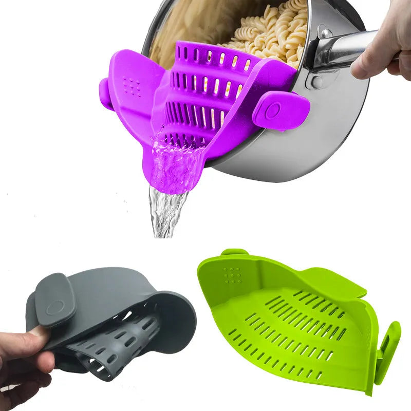 Silicone clip-on kitchen strainer with stainless steel mesh attached to pot rim for draining liquids