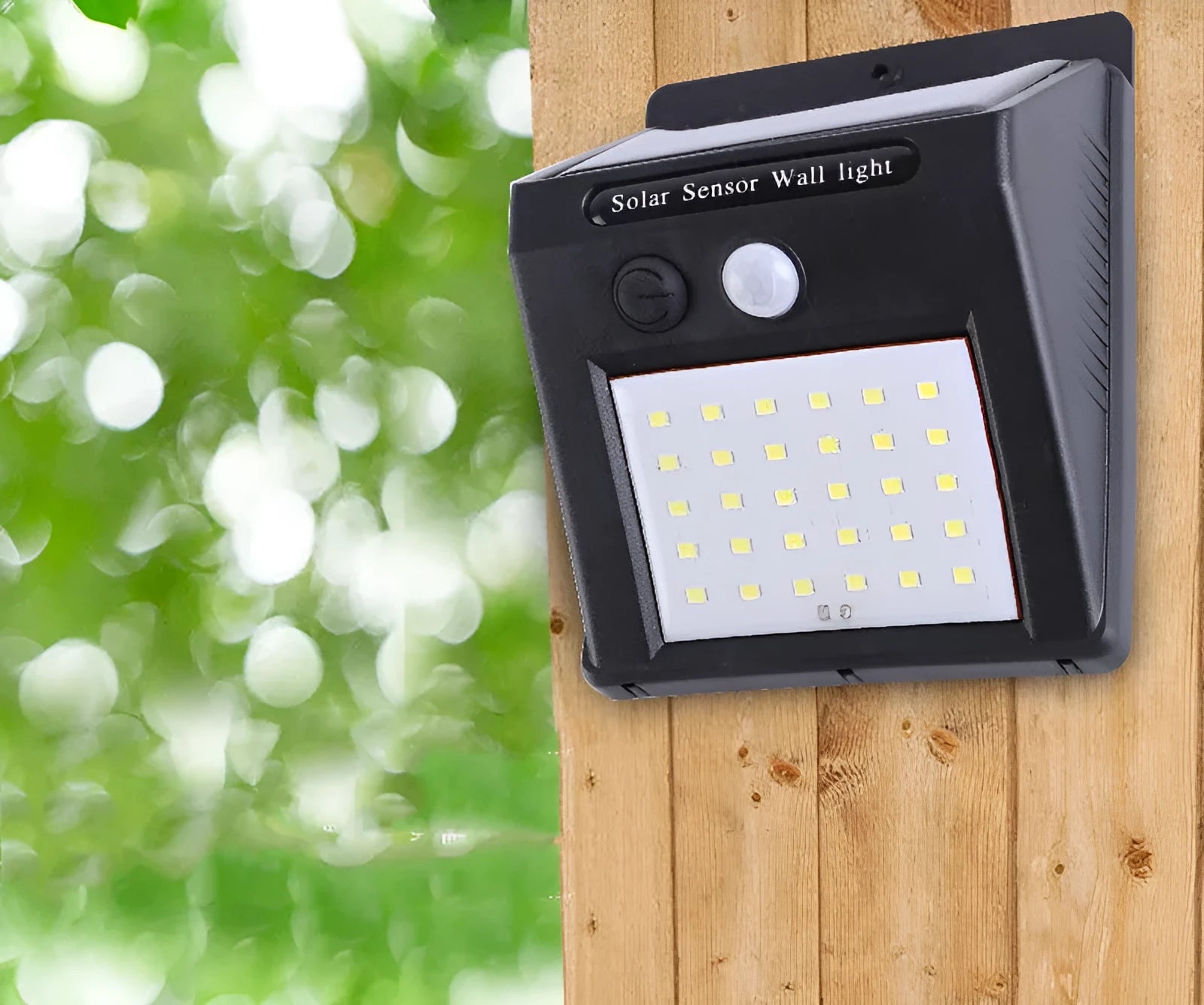 Solar-powered outdoor garden lamp with LED lights and a motion sensor on a stake.