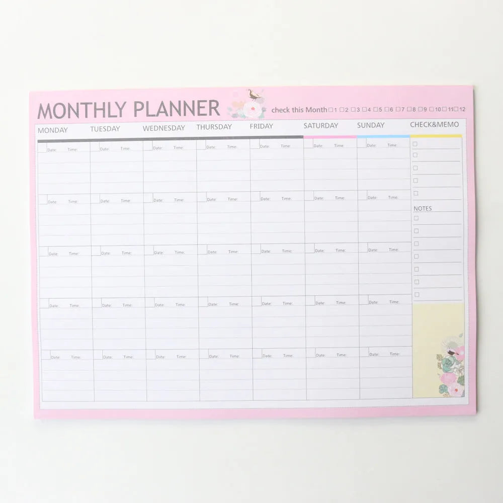 Domikee desk notepad organiser showing pink and green mixed cover with weekly, monthly, today, and memo planning sections