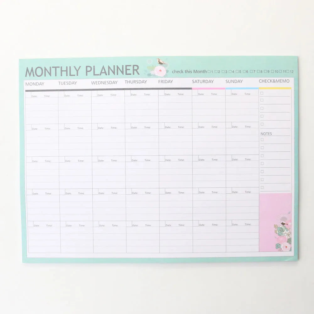 Domikee desk notepad organiser showing pink and green mixed cover with weekly, monthly, today, and memo planning sections