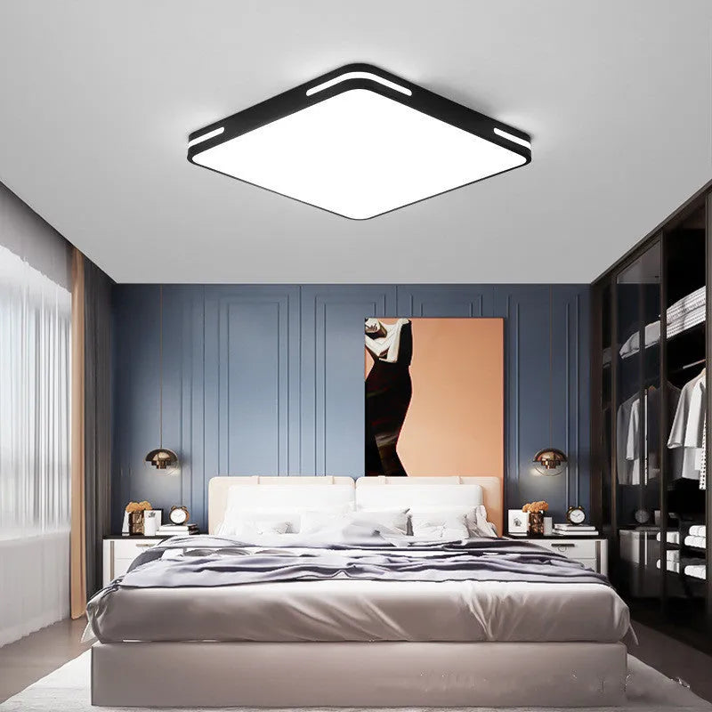 Round ultra-thin LED ceiling lamp in acrylic black or white, 300-600mm diameter, with remote control option.