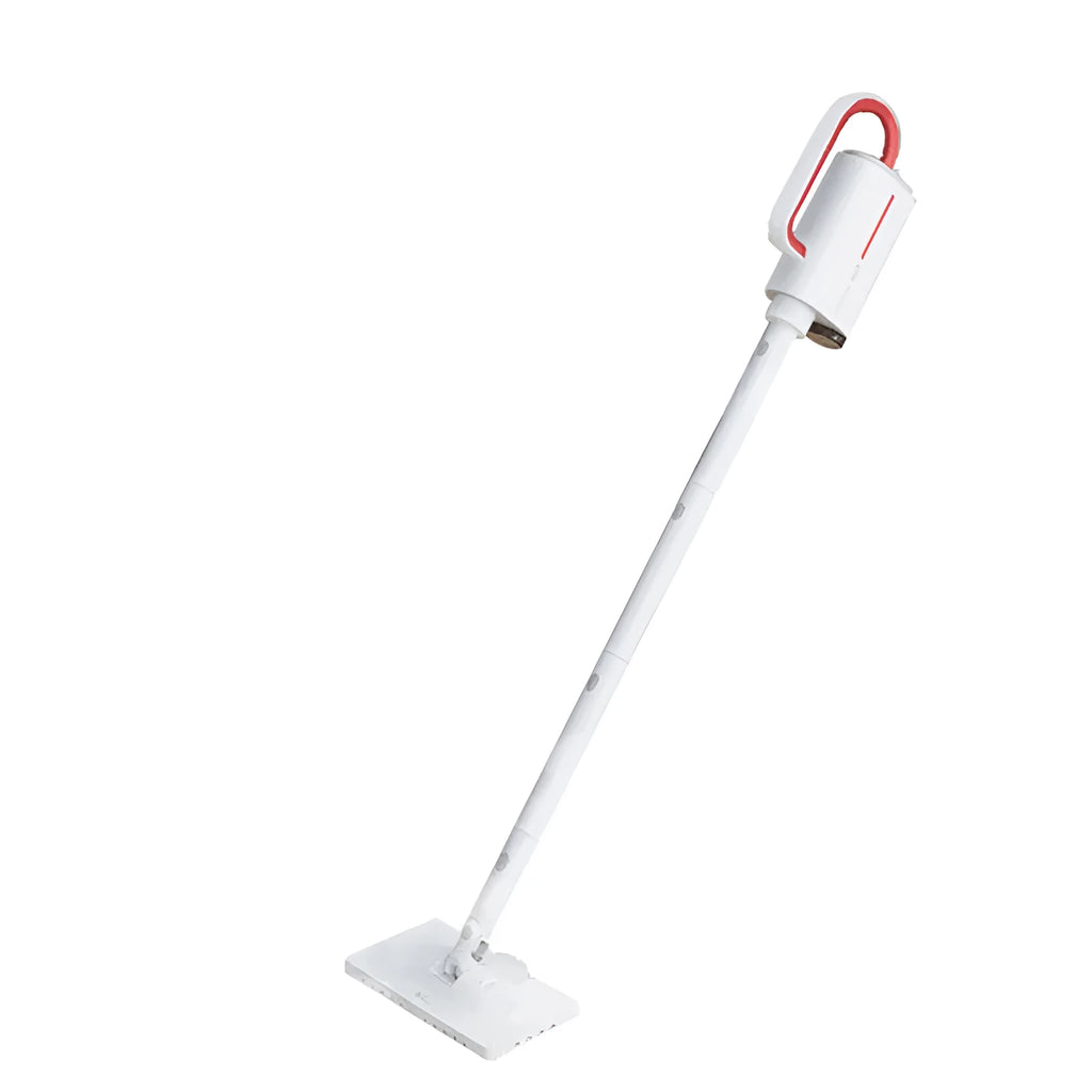 White Deerma DEM-ZQ610 steam cleaner main unit with brush heads and attachments on a table.