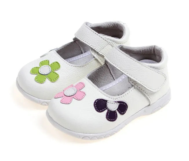 Children's leather princess shoes with velcro strap and embroidery detail, shown in pink.