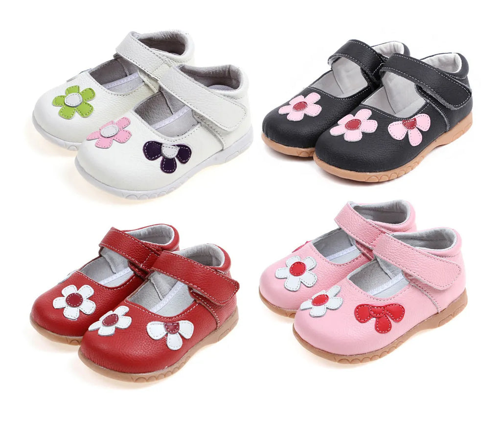 Children's leather princess shoes with velcro strap and embroidery detail, shown in pink.