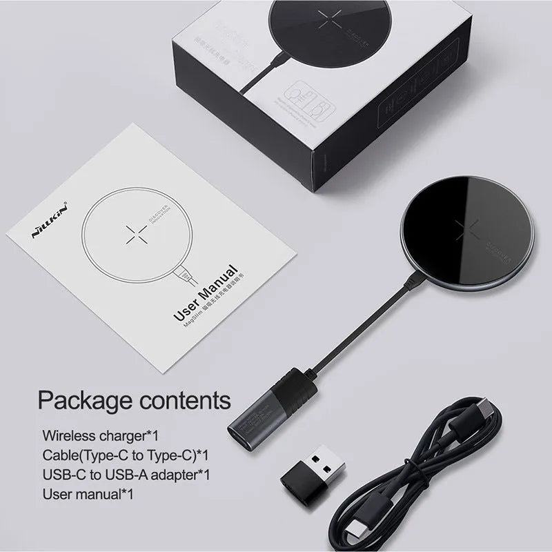 Black MagSlim NKT06 magnetic wireless charger for mobile phones on a flat surface.