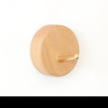 Beech wood and brass wall hook with perforation design in five shapes: round, capsule, oval, diamond, square