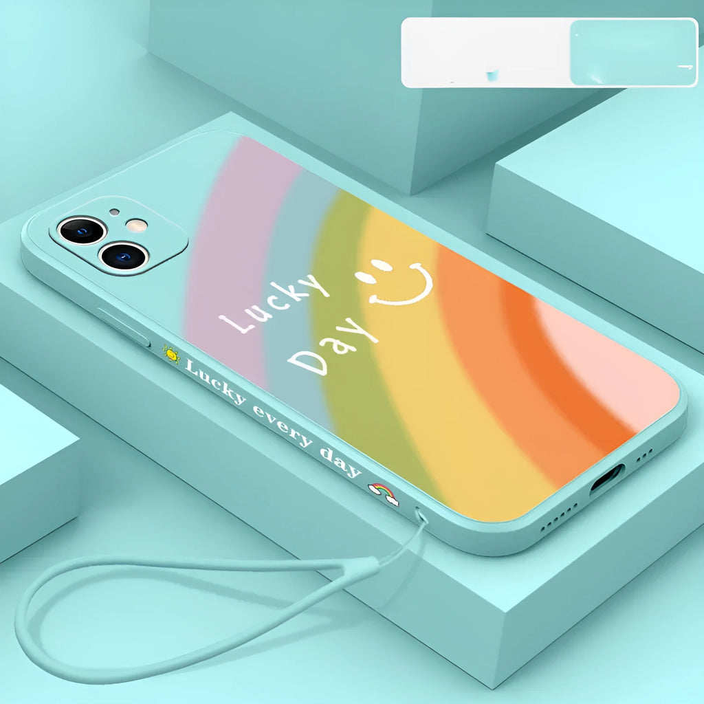 Rainbow smiley face printed on a colourful silicone phone case for iPhone, showing straight-edge design.