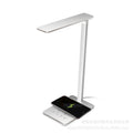 Black or white wireless charging desk lamp with touch control and USB power cable.