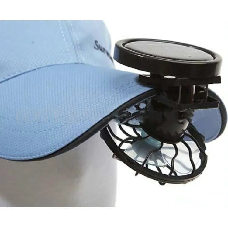 Solar-powered clip-on fan with 10cm blade for outdoor cooling, black design