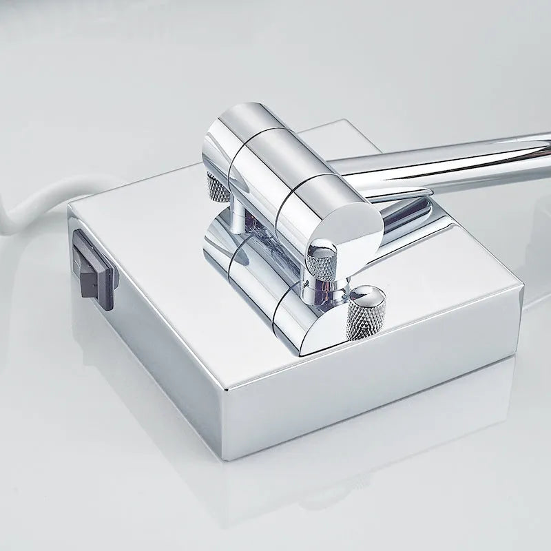 Stainless steel wall-mounted folding bathroom mirror with built-in lamp in a choice of four metallic finishes.