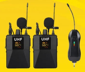 Black Little Bee Lavalier Wireless Microphone X3 clipped onto a shirt collar with USB cable